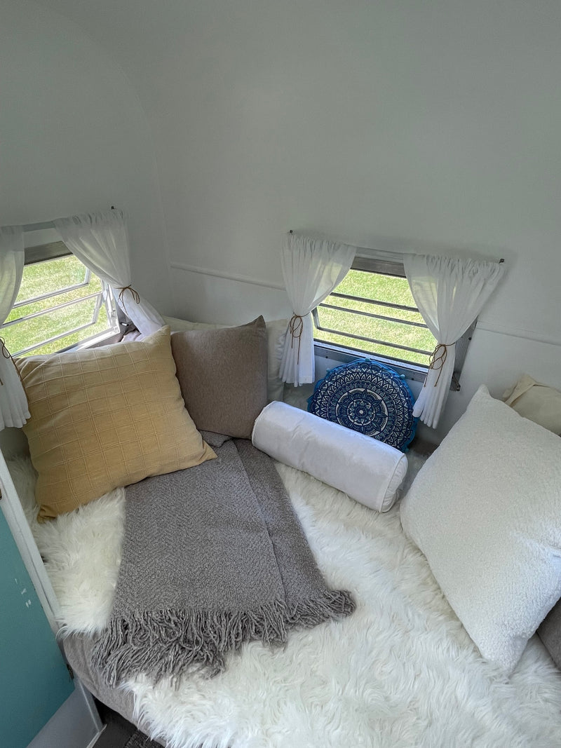  and a loft bed. Perfect for your next adventure!|Step inside this charming RV rental: a bright — photo 8