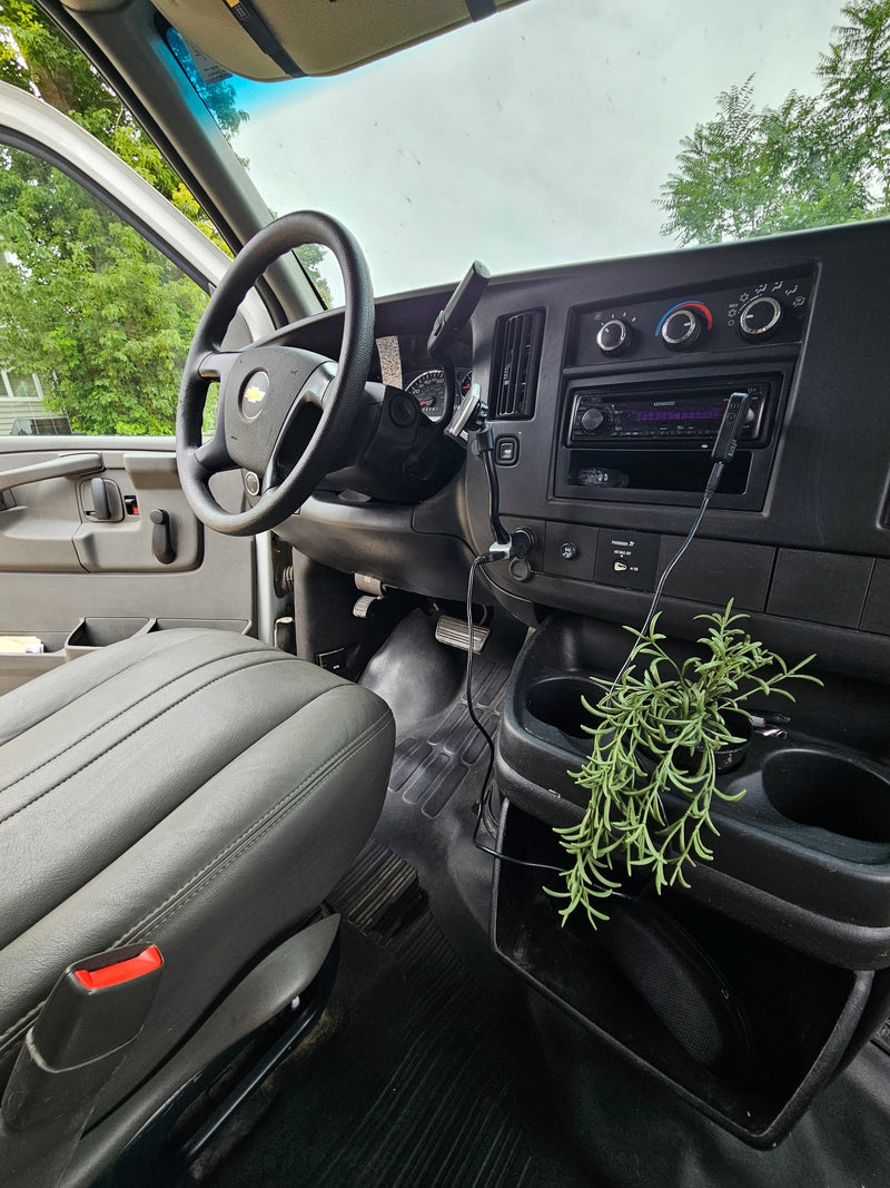  and a comfortable bed. Ideal for road trips.|Cozy rv rental interior with a stunning mountain and lake view from the back. Perfect for van life adventures.|Experience desert nights! White RV rental van parked near a Joshua tree under the moon — photo 9