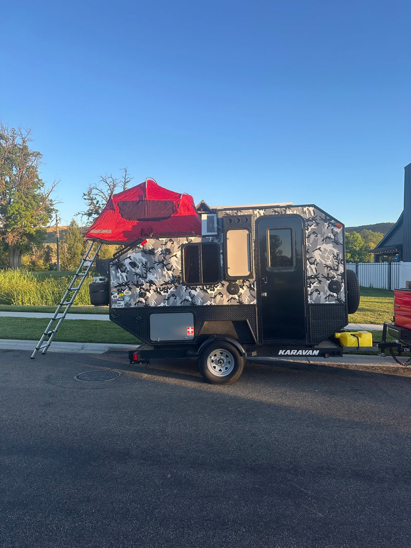 "Karavan" off-road camper trailer with a red rooftop tent — photo 1