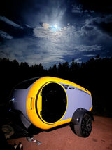 Experience a moonlit camping adventure with this unique yellow & grey RV rental teardrop trailer. Follow @comma_adventures!