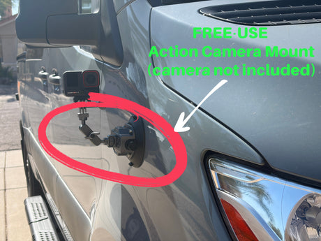 An action camera mount, designated as free-use, is secured to an RV rental van's side, with an action camera attached.
