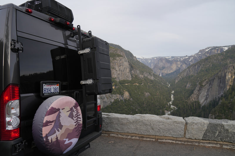 RV rental camper van with gear overlooks Yosemite Valley. Stunning mountain views, river, and waterfall for #vanlife travel. — photo 9