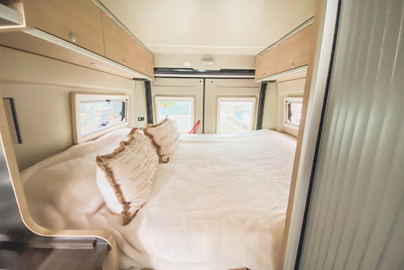  with a pinecone and sink.|This RV rental features a sleek — photo 13