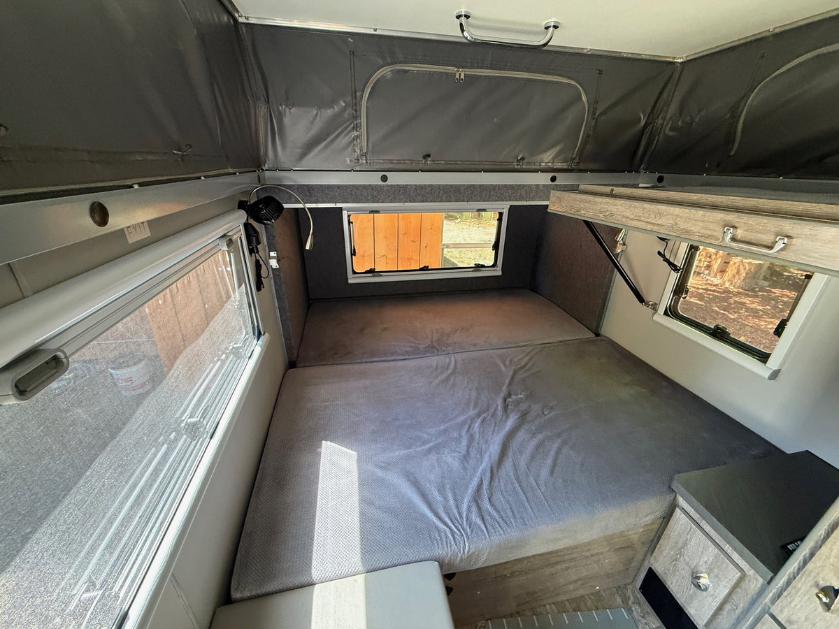 Main sleeping area with the king-size bed, Euro-spec windows with screens and overhead canvas — photo 13