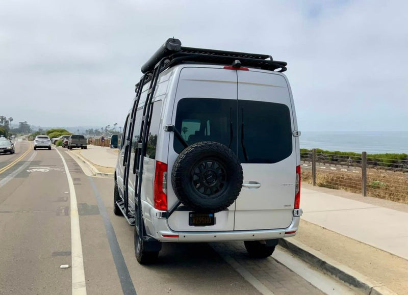  ready for your next RV rental journey.|Silver Mercedes-Benz Sprinter rv rental van with roof & bumper lights — photo 2