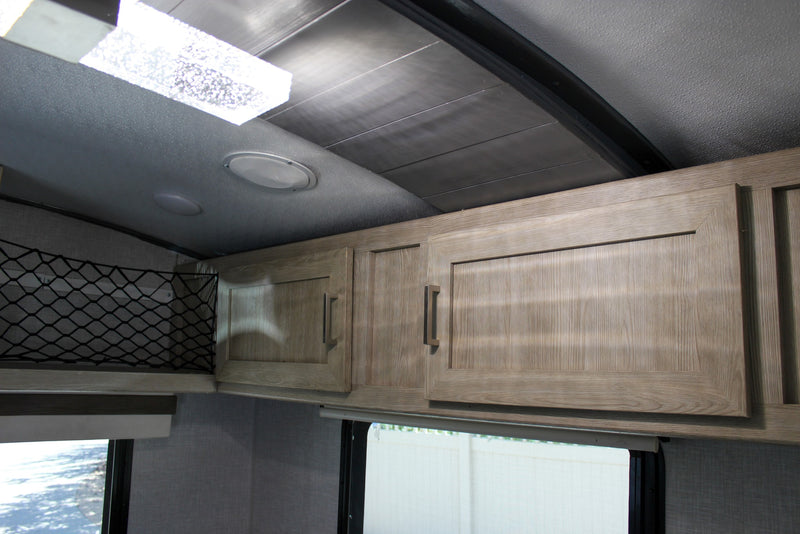  ready for your travel adventures.|Clean RV rental kitchen area features a brushed metal faucet — photo 35