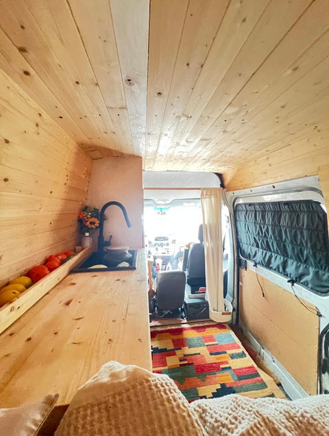 The Million Mile Sprinter | Cozy Wood Cabin Adventure Van overland rental