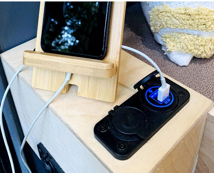  set for mobile living & scenic views.|Van life comfort: a cozy bed setup inside an rv rental