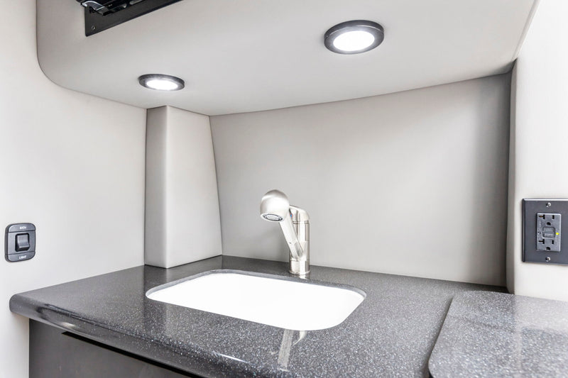  and premium amenities for comfortable travel.|Experience ultimate comfort in this luxury rv rental. Spacious interior — photo 12