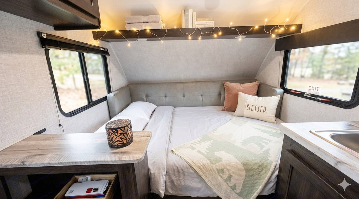  showcasing rv rental options in a scenic setting.|A cozy rv rental interior featuring a comfortable bed