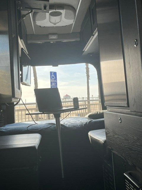  with a beautiful beach view outside.|Golden sunset from an RV rental — photo 3