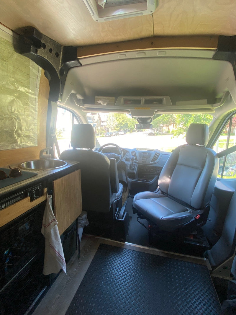  and a street view through the back windows.|This RV rental features a well-equipped — photo 9