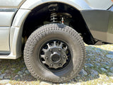 Upgraded Method wheels and Mazama all-terrain tires with advanced suspension on an RV rental, ready for off-road trails.