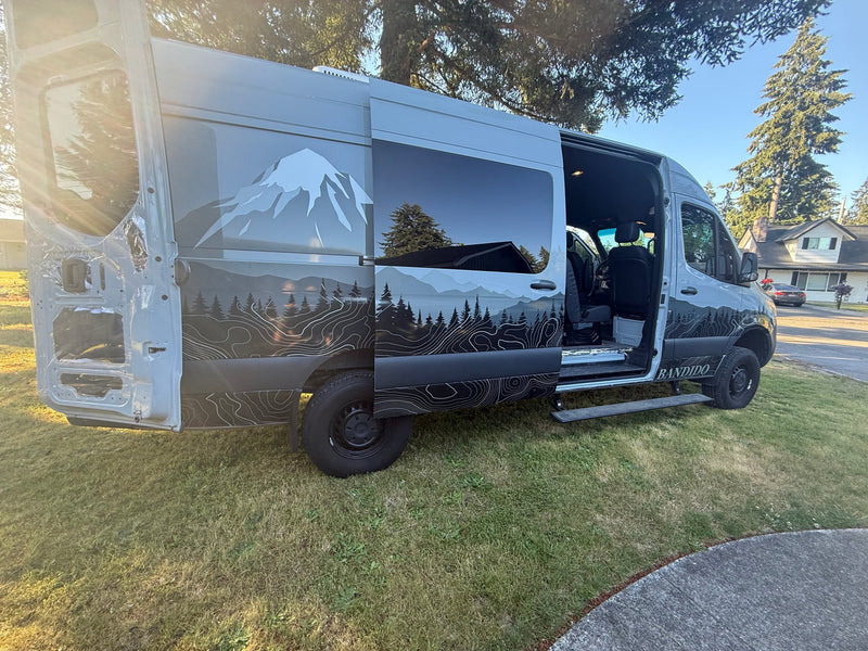 Custom Sprinter van rv rental with mountain and forest graphics — photo 1