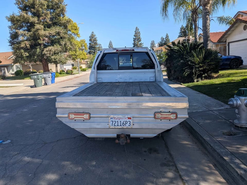 2023 Nissan Frontier Crew Cab · LE Pickup 4D 5 ft in Fresno, CA (photo 4) — photo 4