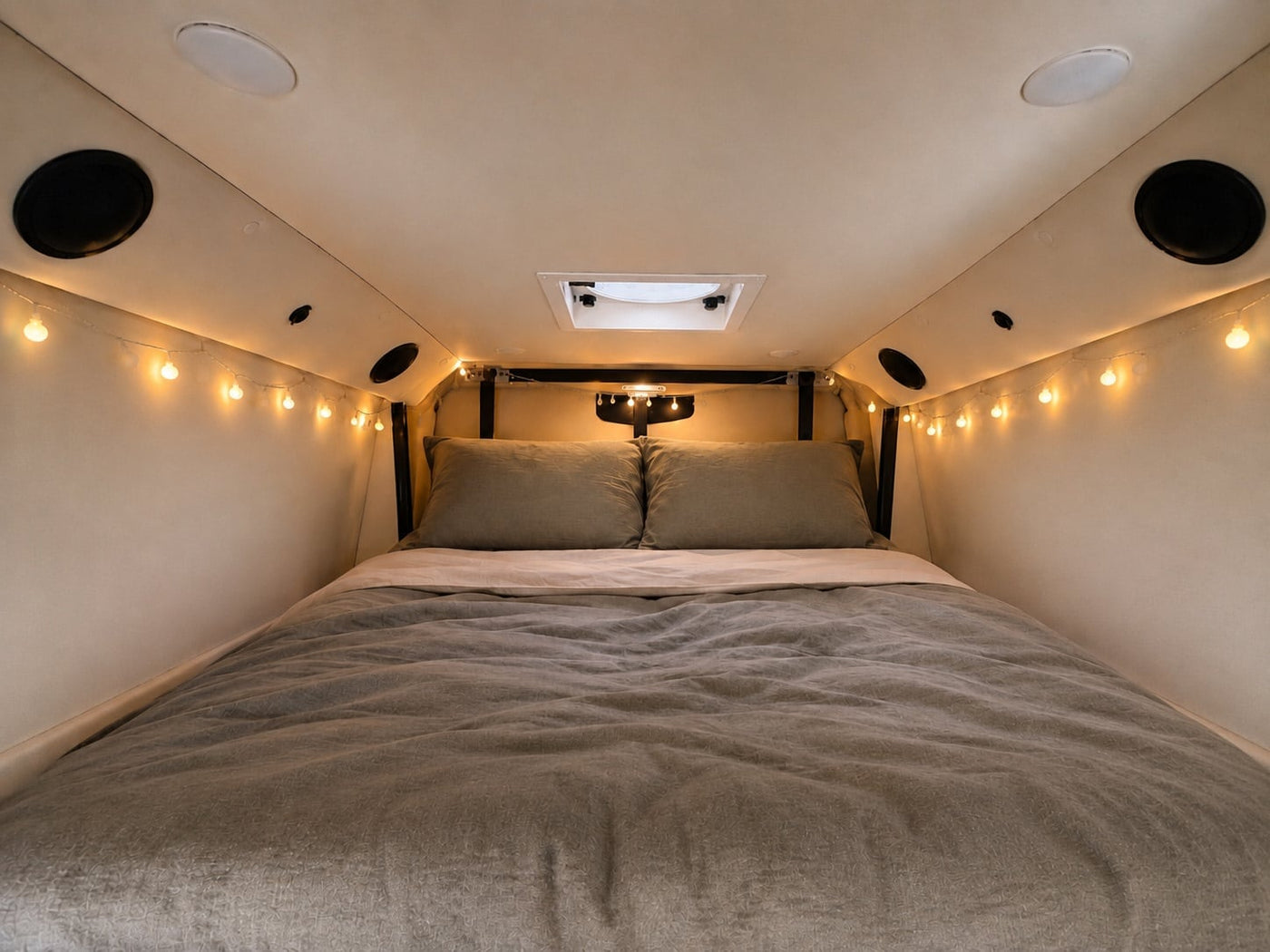  and sage green walls. Driver's seat visible.|Cozy rv rental breakfast: Two healthy breakfast bowls and tea on a wooden table in a sunlit campervan interior.|RV rental interior: two cozy benches — photo 8