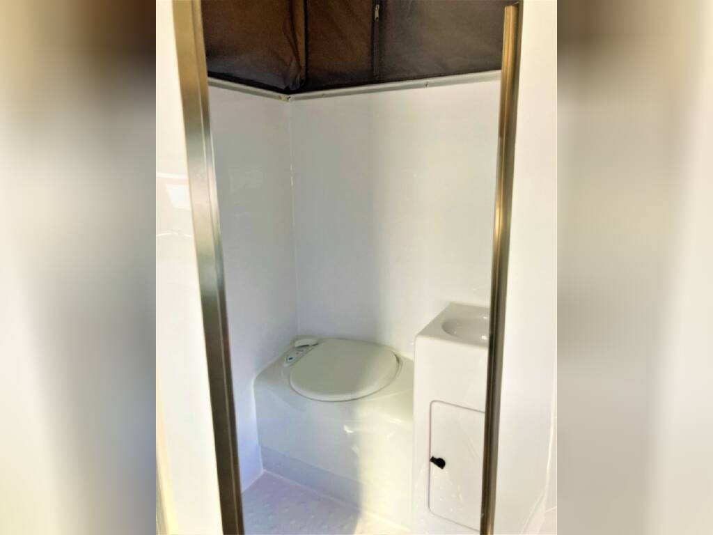  ready for adventure.|RV rental interior: A comfortable bedroom with a large — photo 9