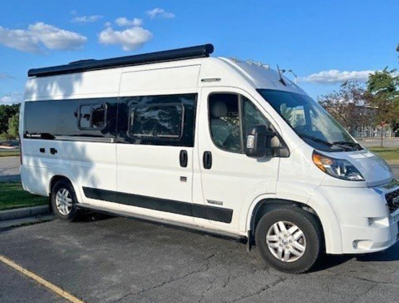 White high-roof camper van — photo 1