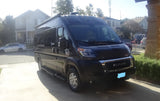 Dark RAM ProMaster RV rental van, perfect for adventures, parked on a residential driveway.