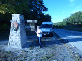 Woman with RV rental at Indiana Dunes National Park, West Beach entrance.