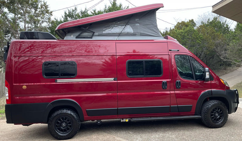  is perfect for an RV rental experience.|Striking red camper van — photo 3