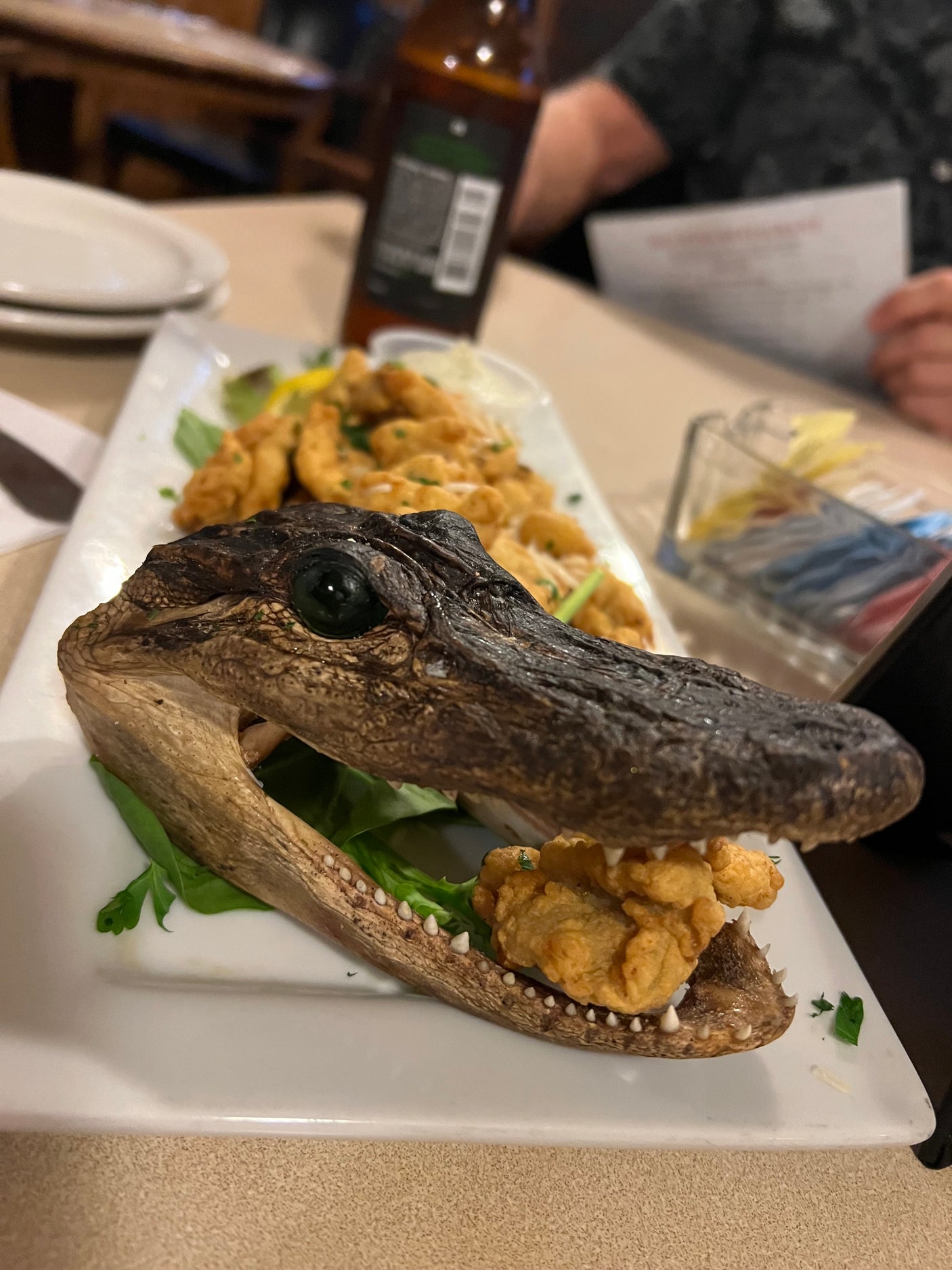 A wild dish! Fried alligator served from an alligator head. Discover unique eateries on your next RV rental road trip.