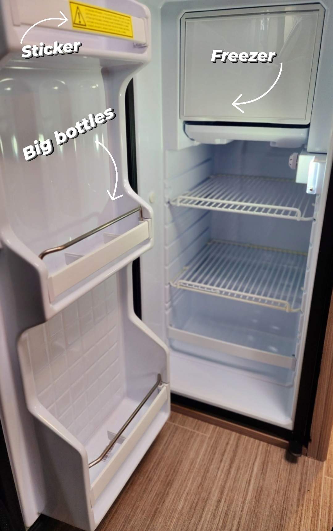  and shower unit.|Spacious RV rental interior with front seating — photo 9