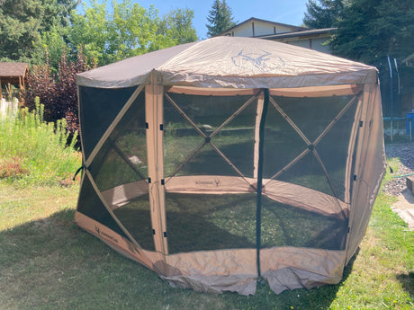 Enhance your RV rental experience with this Gazelle screen tent, offering a spacious, bug-free outdoor living area for camping.