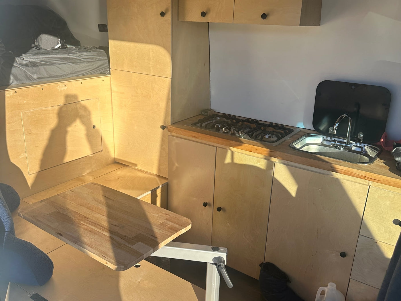  viewed from a cozy RV rental.|Compact RV rental kitchen — photo 6