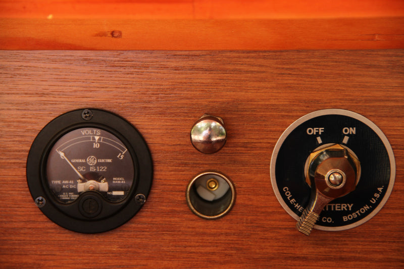 RV rental internal control panel: Voltmeter, 12V socket, and Cole-Hersee battery switch set to "OFF". — photo 18