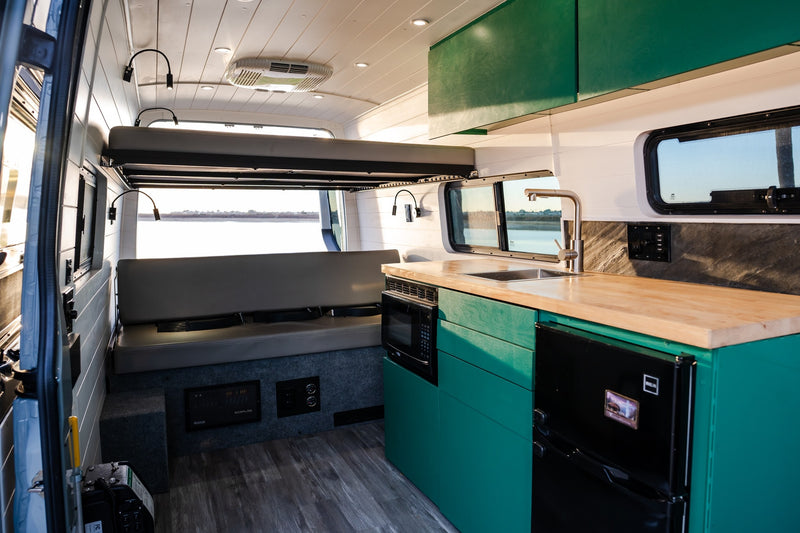  3) with a seat adjustment switch.|Spacious RV rental driver's cockpit with modern dash — photo 16