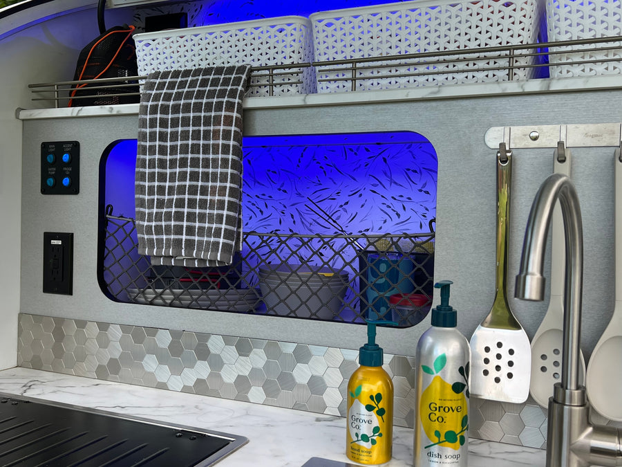  perfect for camping.|This RV rental's sleek outdoor kitchen includes a sink