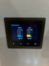 RV rental's Simarine digital display shows inside (69.6°F) and outside (56.3°F) temperatures for monitoring comfort.