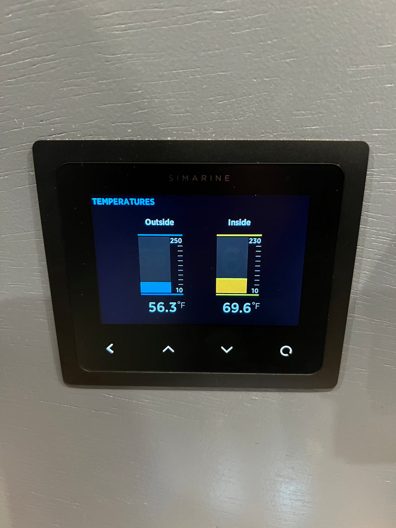 RV rental's Simarine digital display shows inside (69.6°F) and outside (56.3°F) temperatures for monitoring comfort. — photo 7