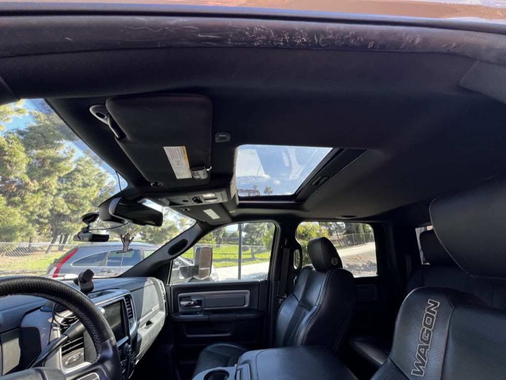  ideal for rv rental.|Roomy black leather interior of a truck — photo 7