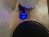 RV rental interior showing a dual USB charger (5V 2.4A) with blue light, next to a speaker, for convenient device charging.