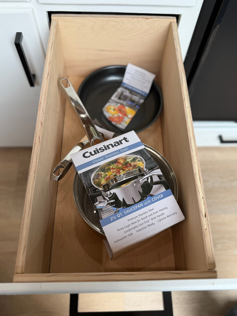 Cooking essentials for your rv rental: a Cuisinart 2 1/2 QT stainless steel saucepan and frying pan neatly stored in a wood drawer. — photo 14