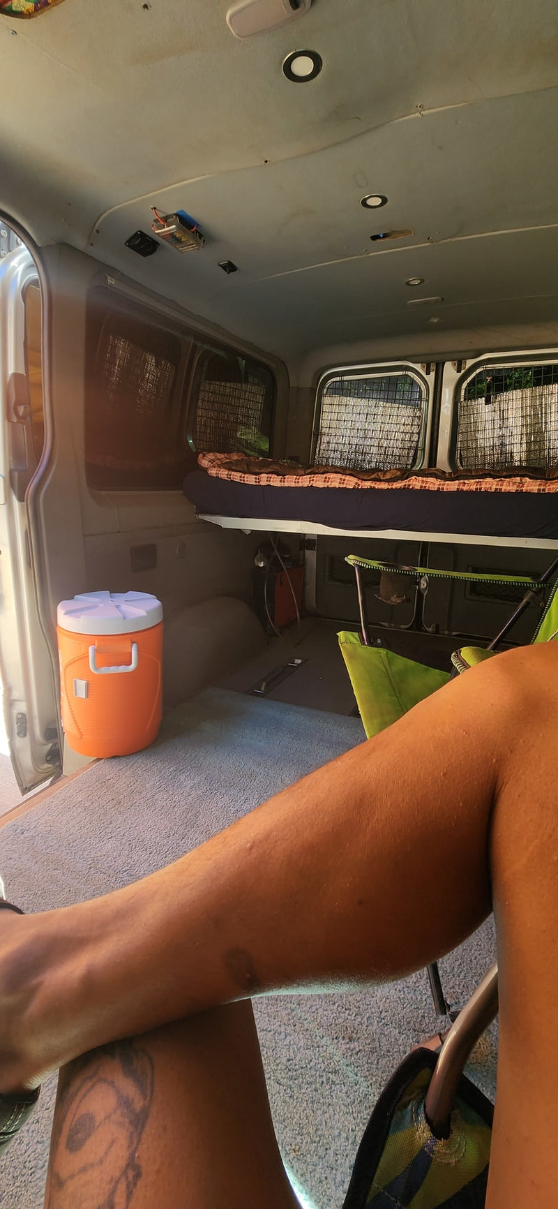  and decorative ceiling fan.|Inside an RV rental: a cozy elevated bed — photo 6
