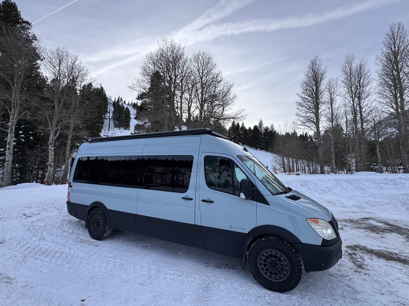  and a crescent moon.|Light grey camper van — photo 19