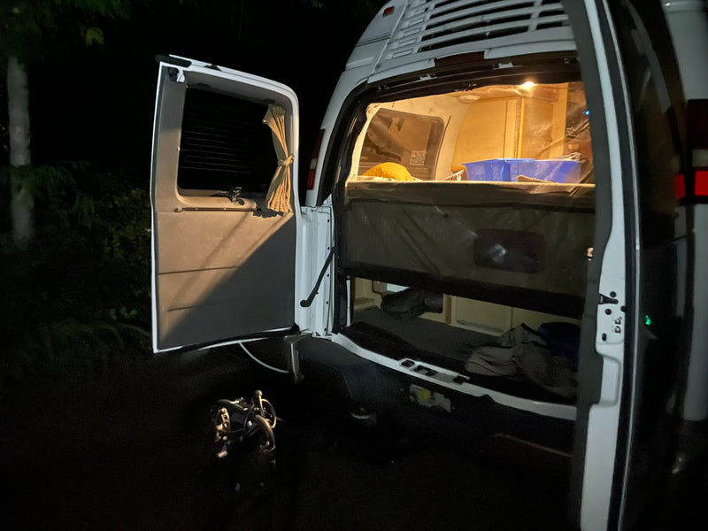 and bike setup.|Cozy RV rental kitchenette with microwave — photo 13
