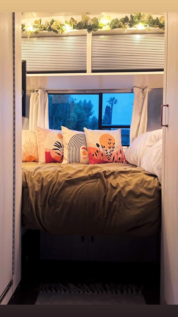  perfect for a nature escape.|Cozy RV rental bedroom with comfy bed — photo 2