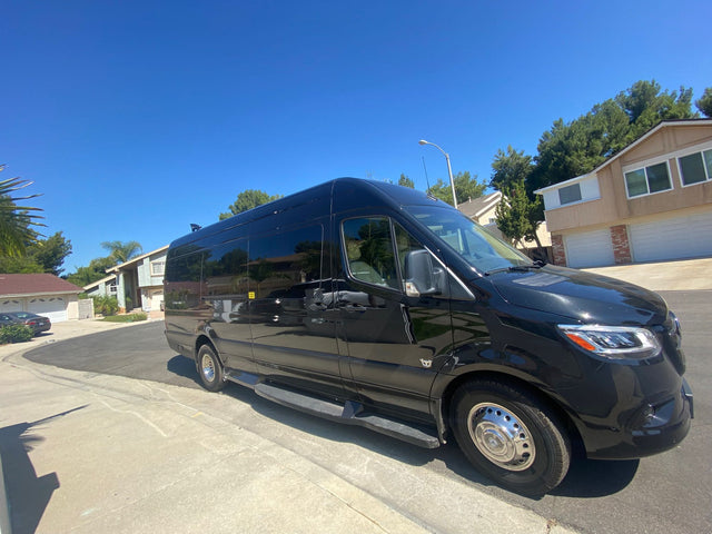  and sleek wood accents.|Relax in this luxurious rv rental interior with plush tan seats