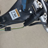 RV rental trailer hitch with "2" Ball REQUIRED" warning and electrical wiring for safe towing.
