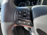 RV rental: Steering wheel with cruise control (SET, RES, CAN, LIM) and volume controls, plus dashboard details.