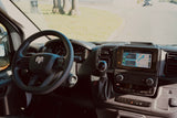 RV rental: Driver's view of a modern dashboard, Ram steering wheel, and navigation screen, ready for a road trip.