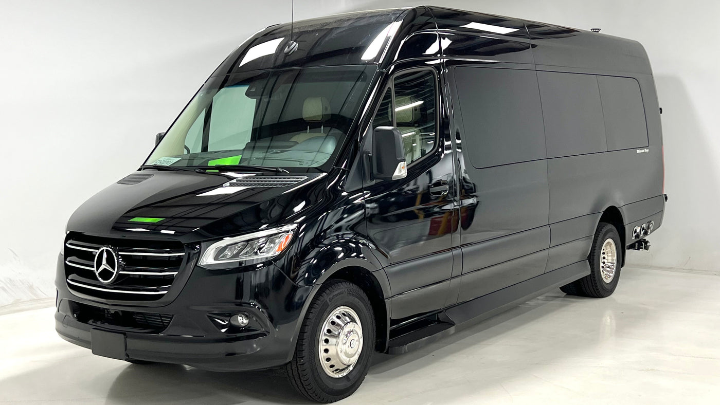 Experience luxury travel in this black Mercedes-Benz Sprinter camper van, ideal for rv rental. Sleek and polished.