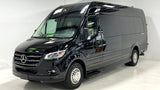 Experience luxury travel in this black Mercedes-Benz Sprinter camper van, ideal for rv rental. Sleek and polished.