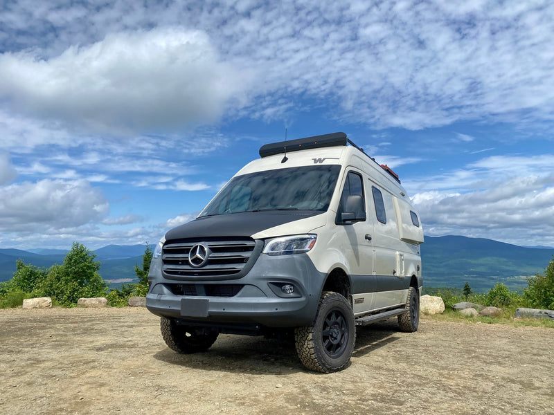 Winnebago Revel Sprinter camper van RV rental parked atop a mountain — photo 1