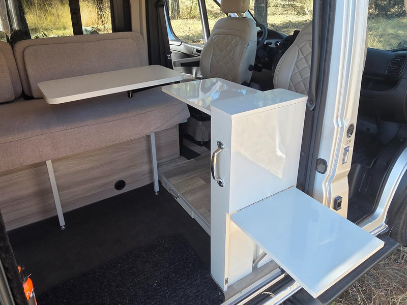  and a view of dry nature from the open door.|RV rental interior features swivel captain's chairs — photo 18