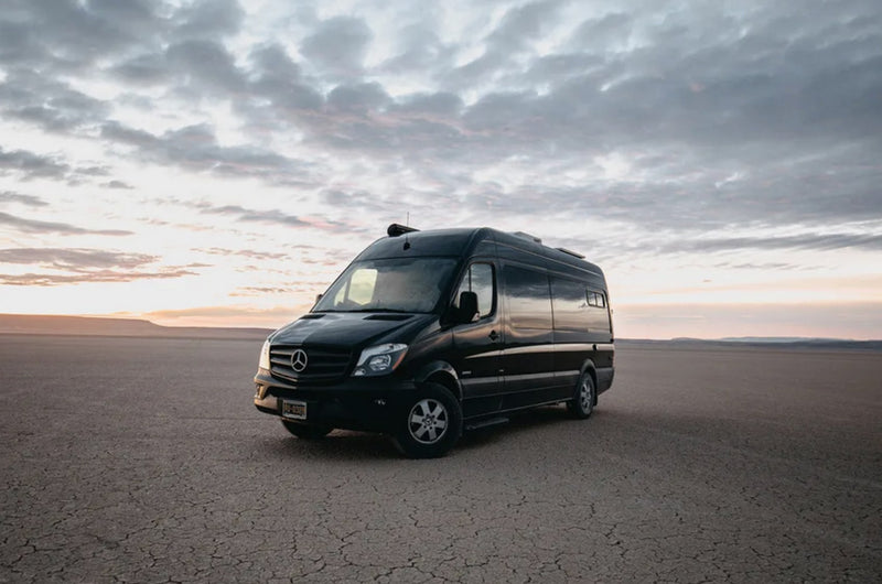 Black Mercedes Sprinter camper van rv rental on a vast — photo 1